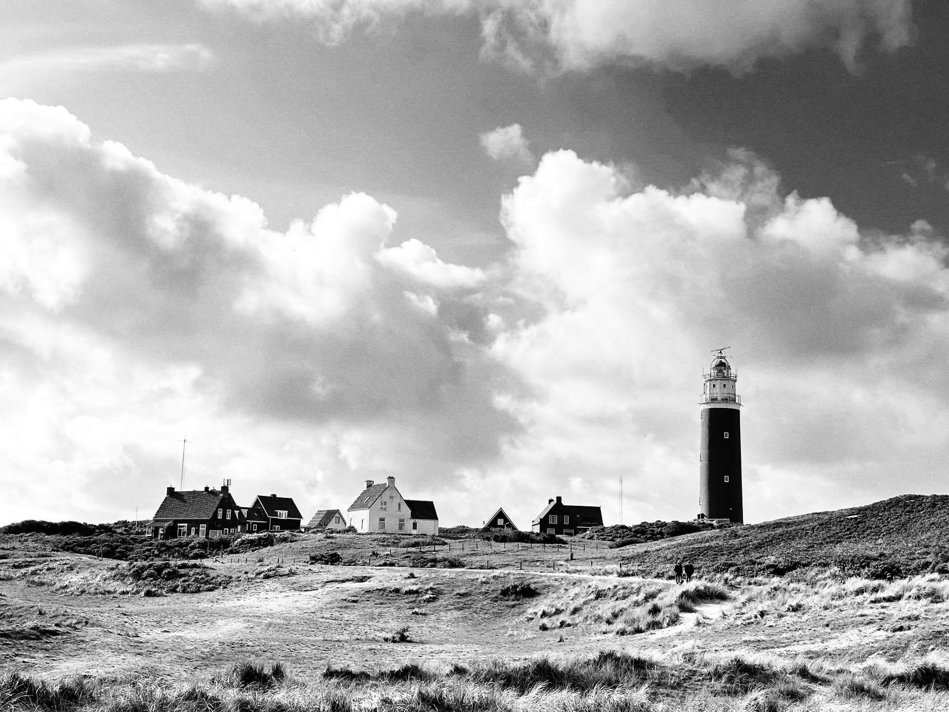 Dunes, lighthouse and houses
